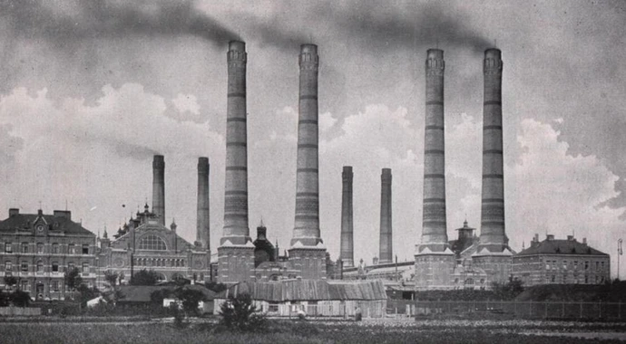 Das Elektrizitätswerk Simmering mit gemauerten Ringöfen der Wiener Firma Gussenbauer & Sohn, eine der renommiertesten Firmen im Schornsteinbau. Quelle: Das neue Wien. Städtewerk. Band 3. Wien, 1927, S. 335 Schornsteine in Wien – Teil 1