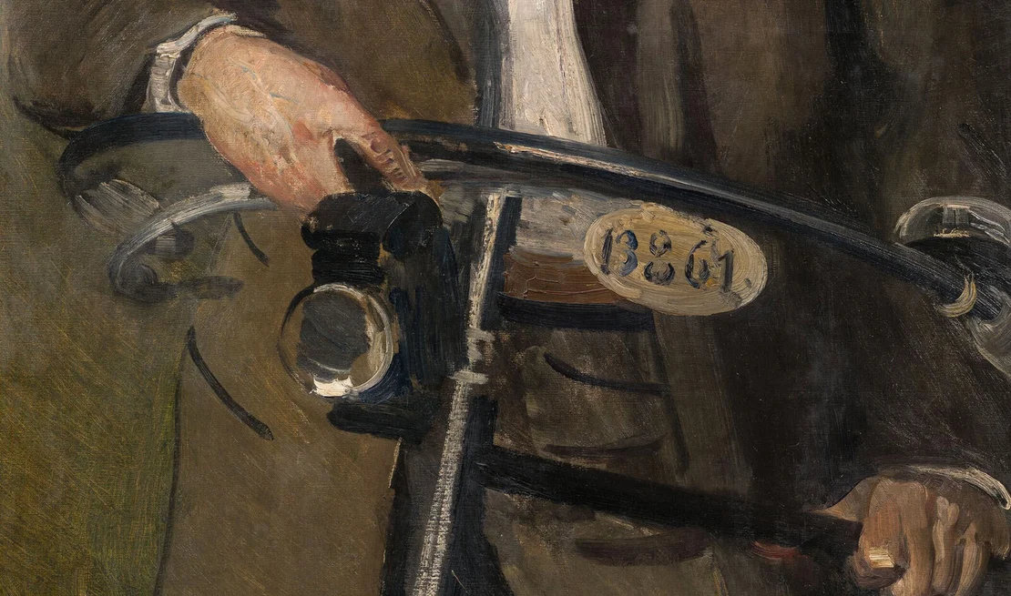 Detail aus: Hans Temple: Porträt des Malers Hans Wilt mit Fahrrad, 1894-97, Öl auf Leinwand, Wien Museum Inv.-Nr.  315598   